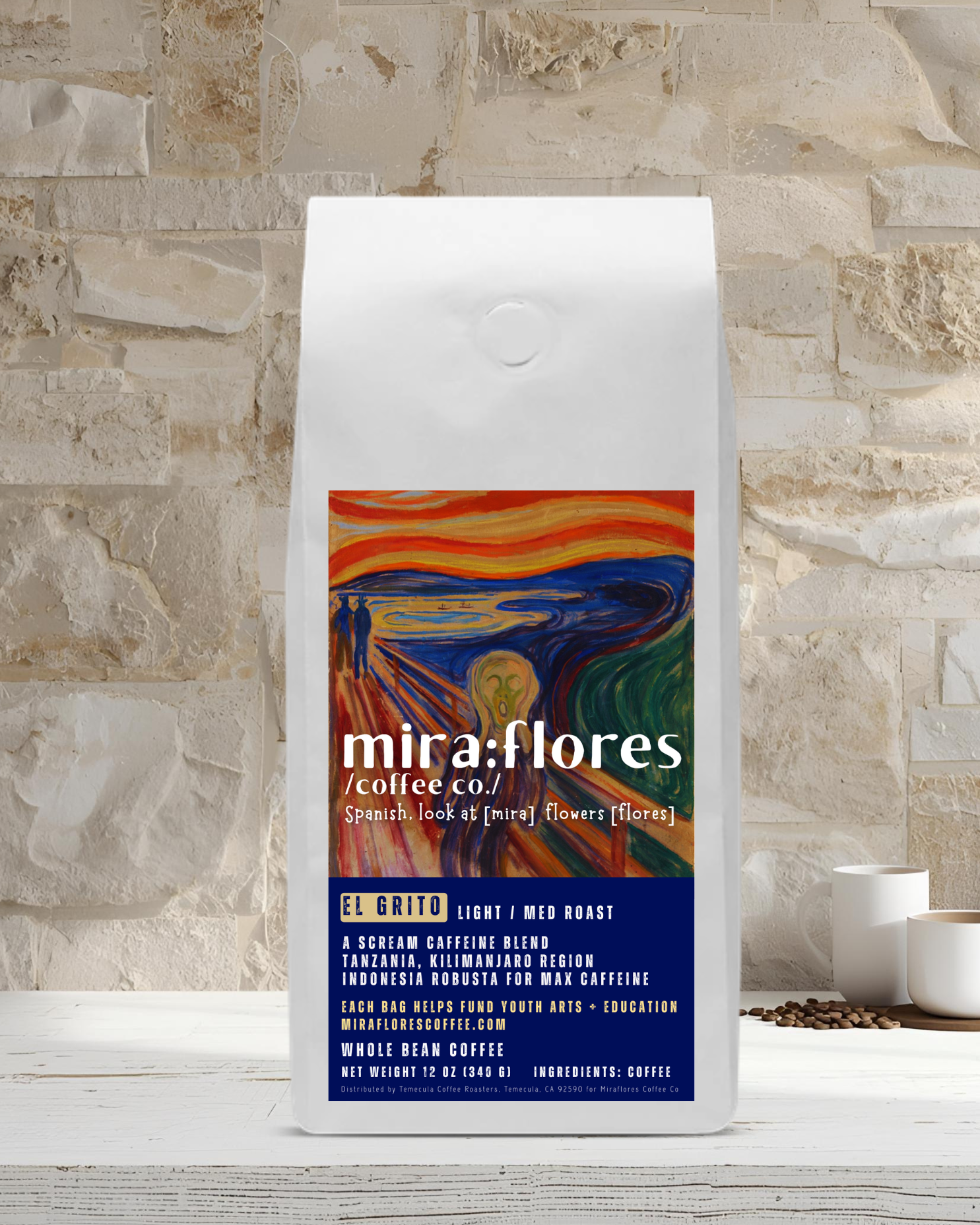 Specialty coffee bag for Max Caffeine light roast with miraflores branding and art masterpiece The Scream by Edward Munch, set against a stone wall background