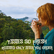 A woman enjoying a cup of coffee in the outdoors with lush greenery and mountain views, it's a cool, brisk day, with clouds passing over the tops of the hills. Caption reads tastes so fresh, roasted only after you order.