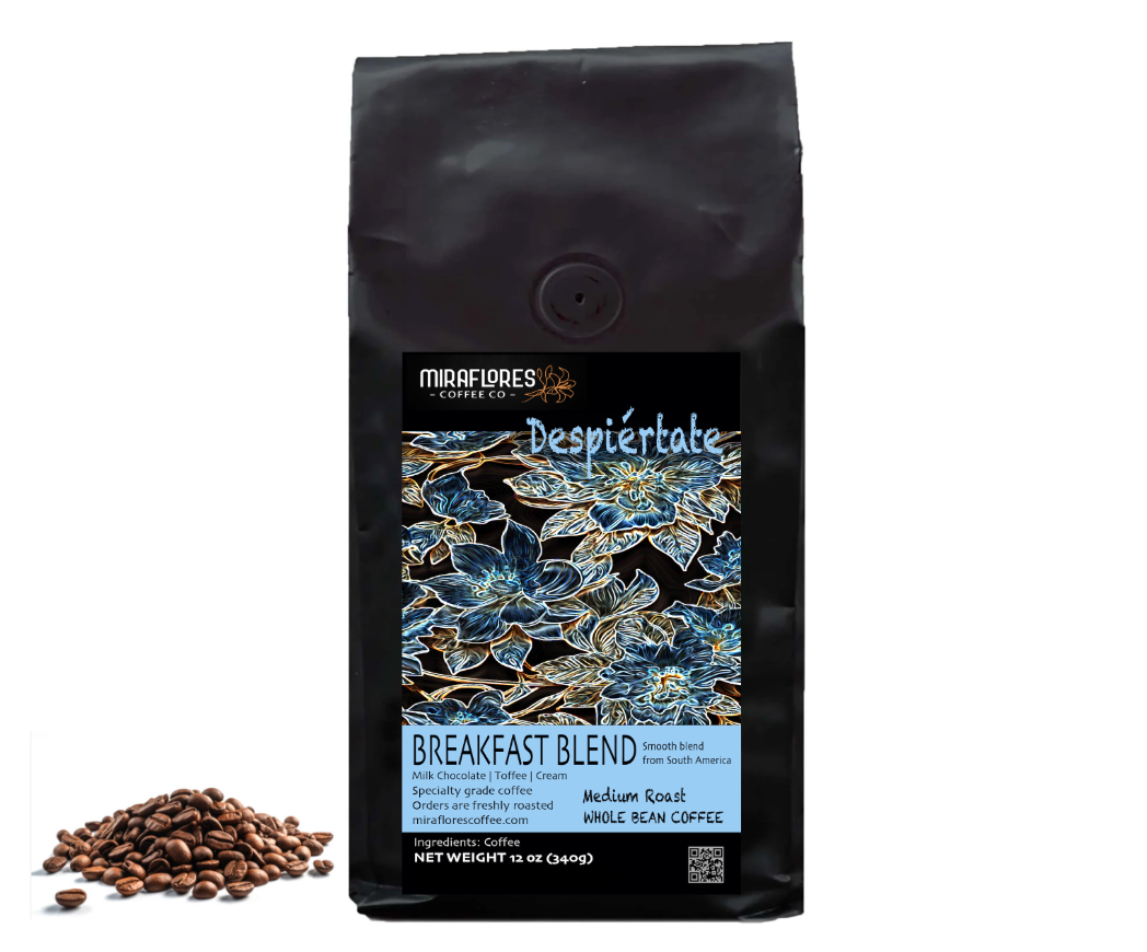 Bag of Despiertate Breakfast Blend coffee from Miraflores Coffee showing flavor notes of milk chocolate, caramel and cream, bag is set alongside roasted coffee beans on.a white background
