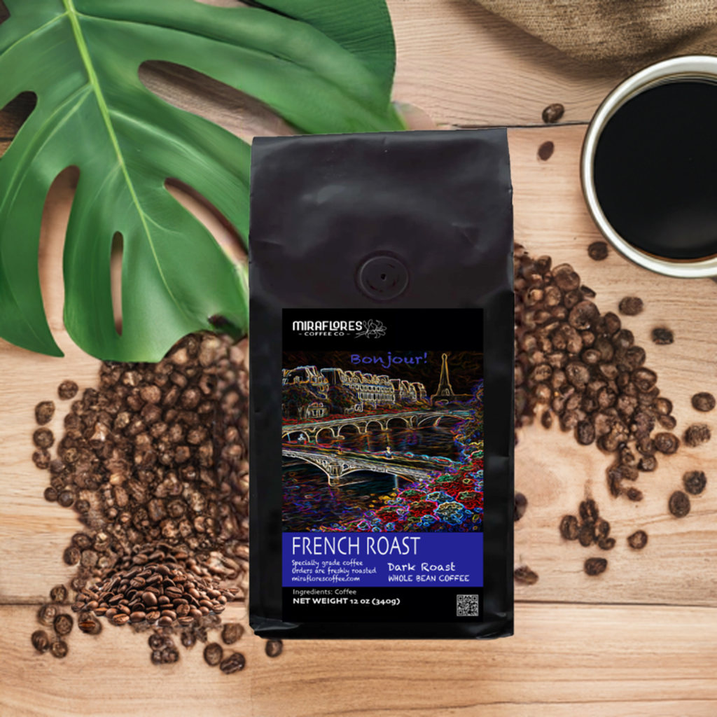 Bag of French Roast coffee from Miraflores Coffee Co. showing art of the seine and eiffel tower, bag is set alongside roasted coffee beans, a cup of balck coffee, and plants on.a wooden table