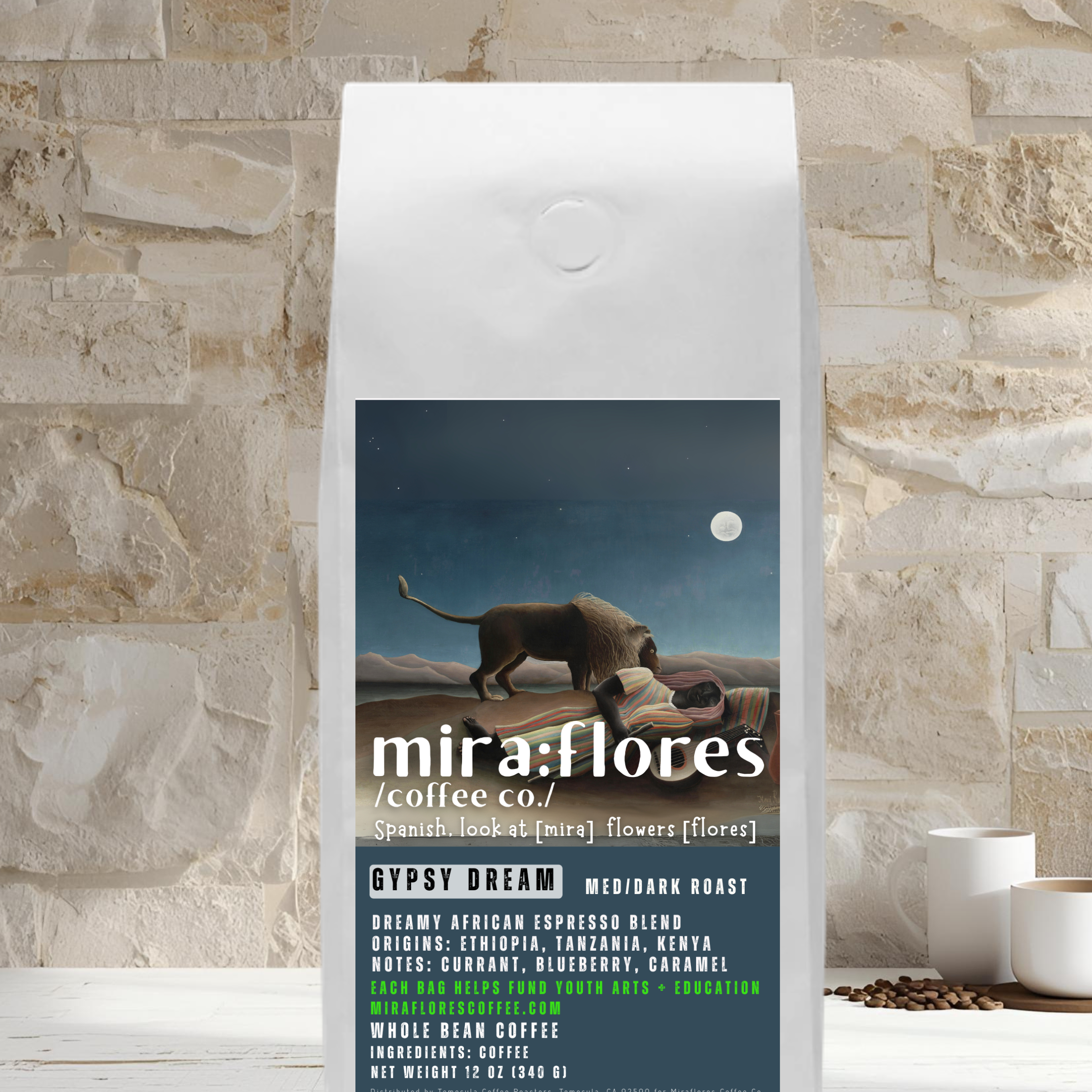 Specialty coffee bag for a dreamy dark roast espresso made from beans from Africa. Bag has Miraflores Coffee branding and features art masterpiece The Sleeping Gypsy by Henri Rousseau, set against a stone wall background