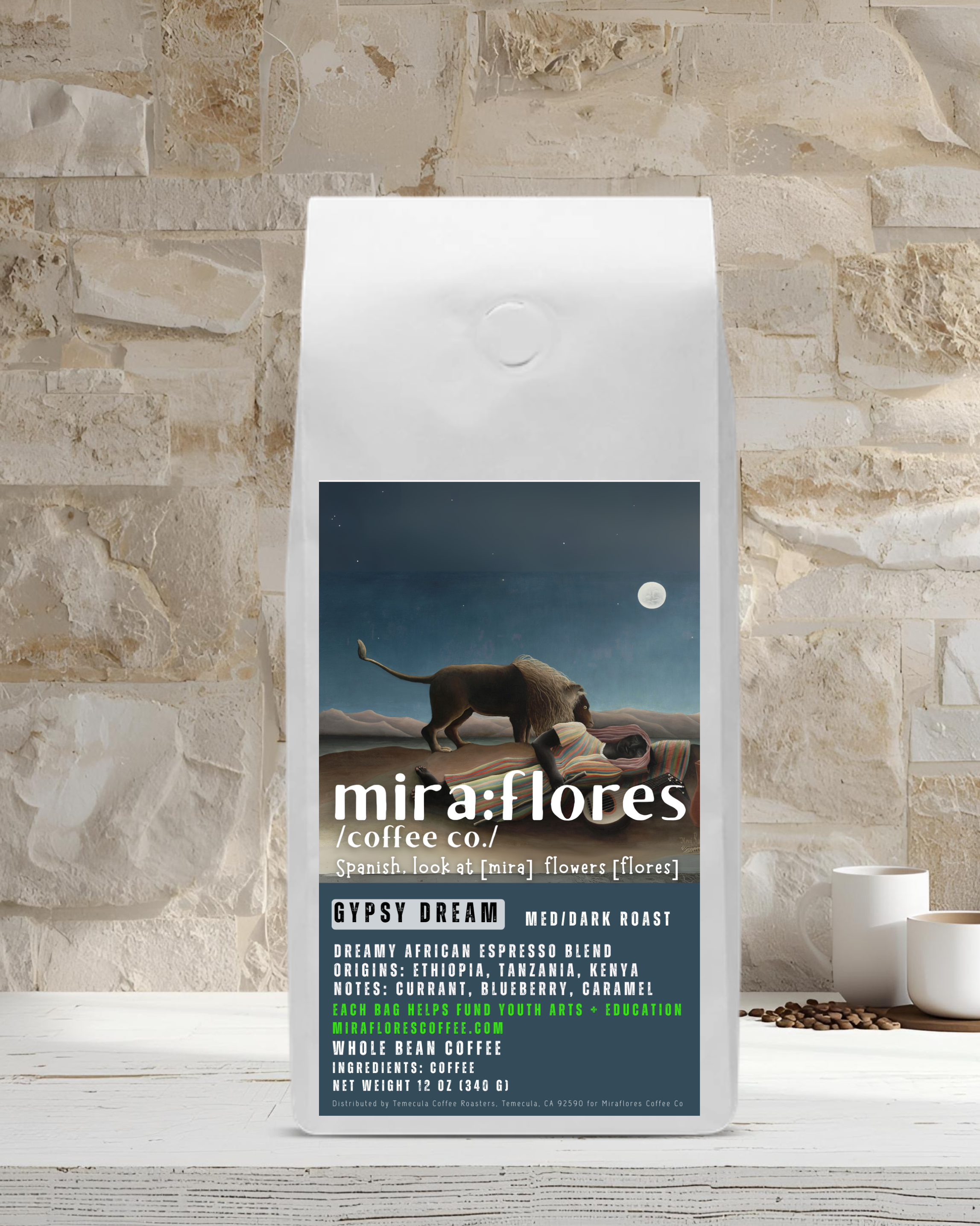 Specialty coffee bag for a dreamy dark roast espresso made from beans from Africa. Bag has Miraflores Coffee branding and features art masterpiece The Sleeping Gypsy by Henri Rousseau, set against a stone wall background
